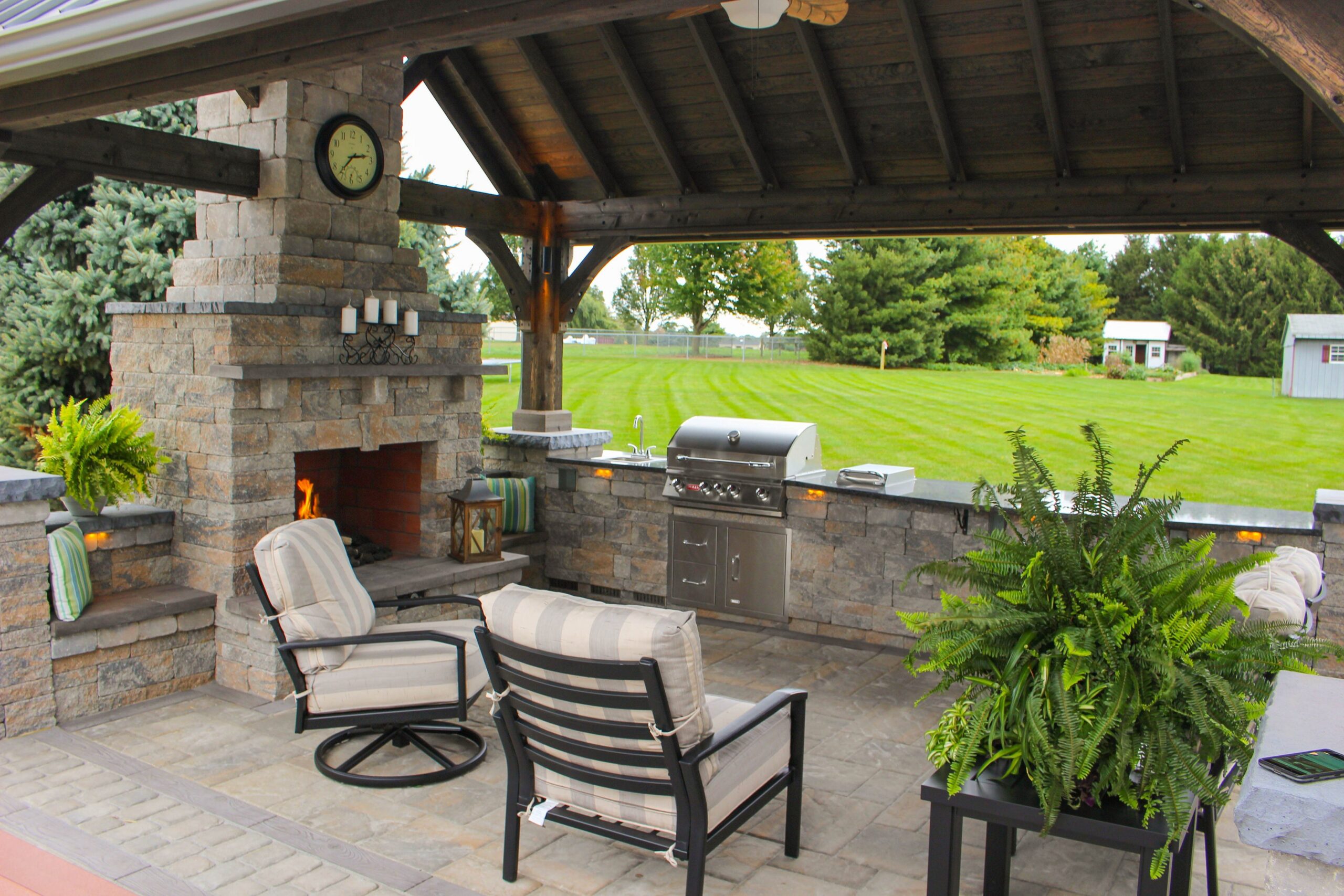 Backyard outdoor kitchen and fireplace